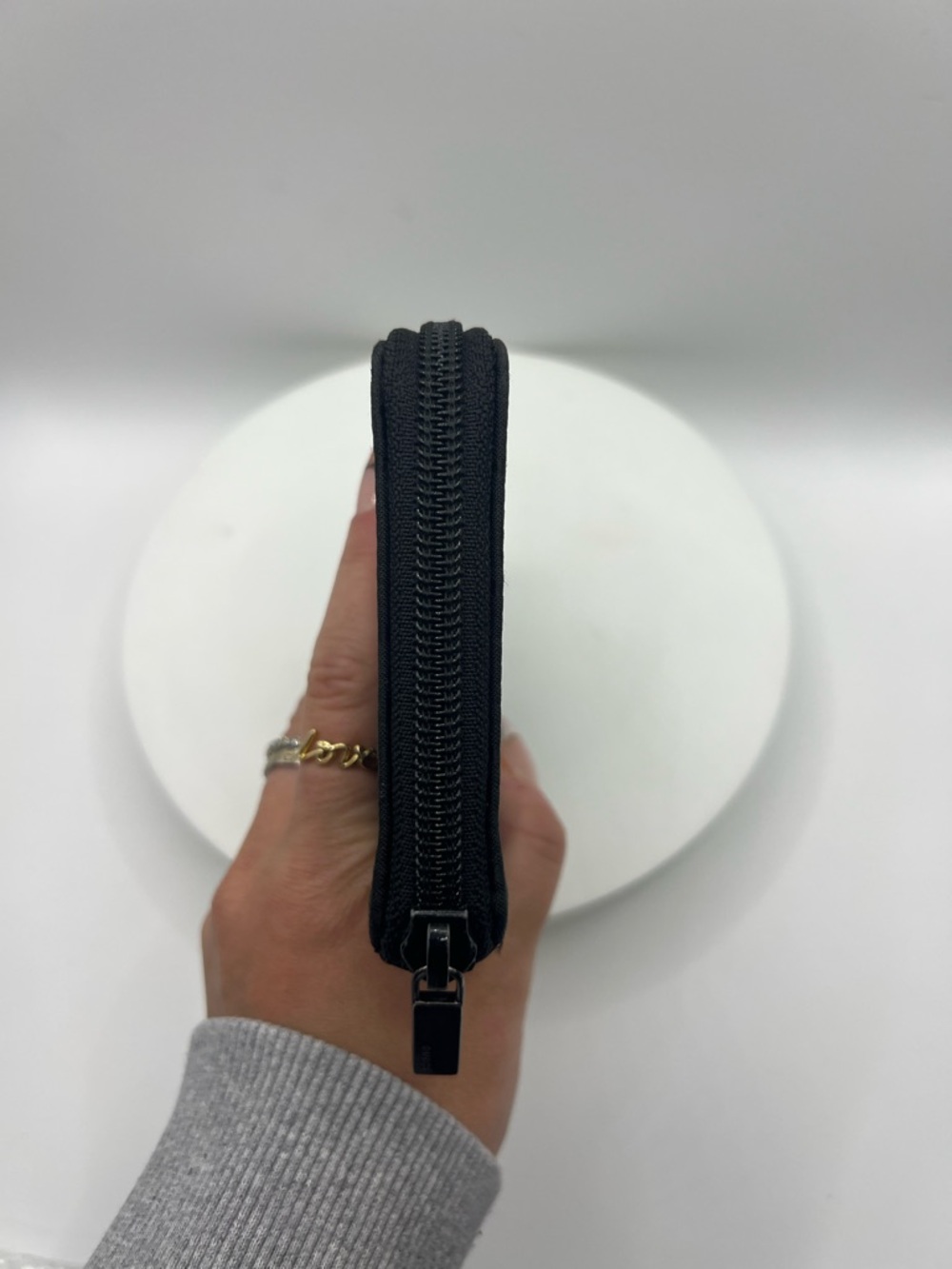 7049. Authentic Gucci Black GG Canvas Zip Around Bifold Wallet. - Picture 5 of 16